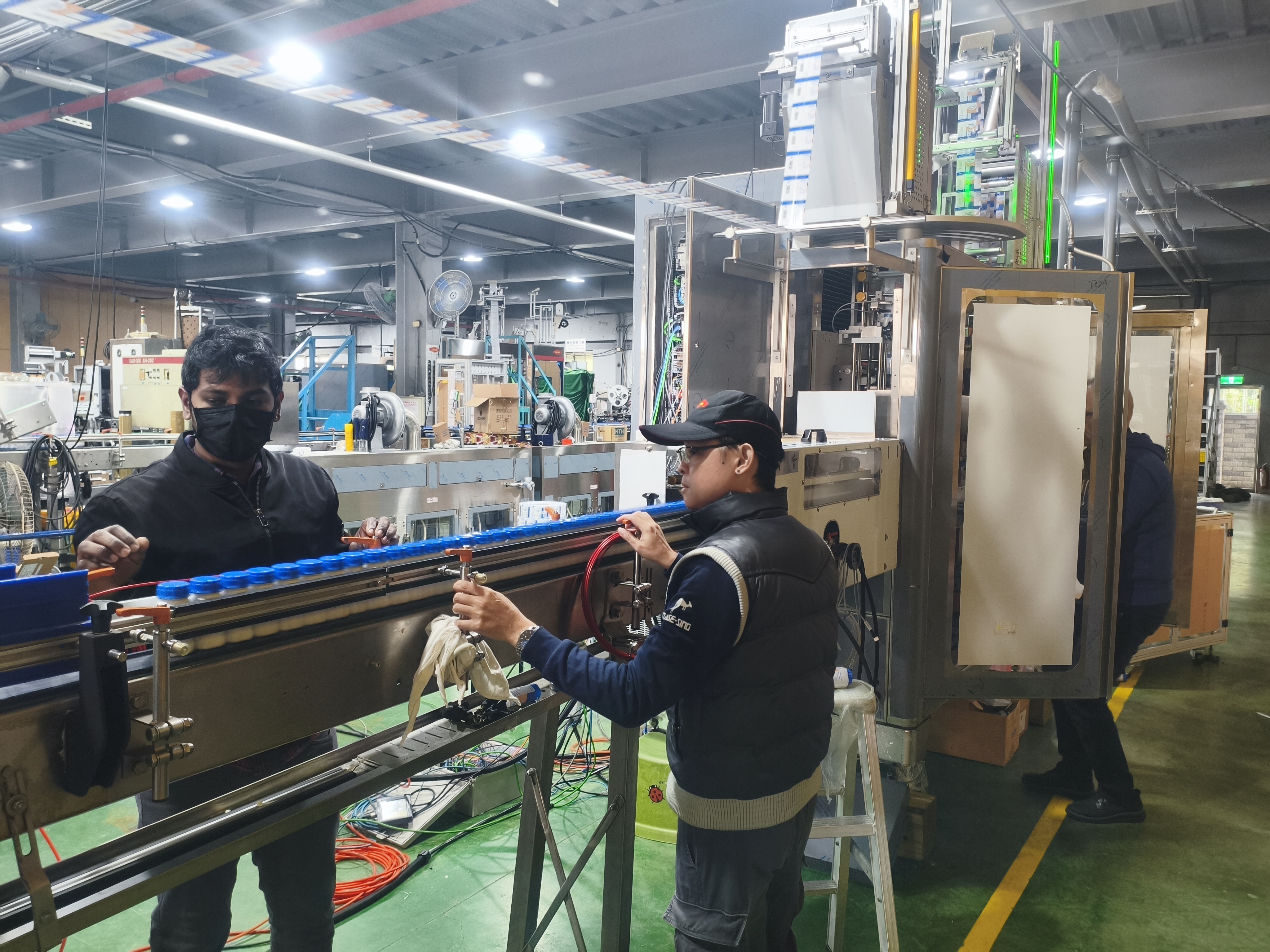 The TUV sleeve applicator added a lot of safety mechanism not only in hardware but also in software. and Dase-Sing engineer are testing it.