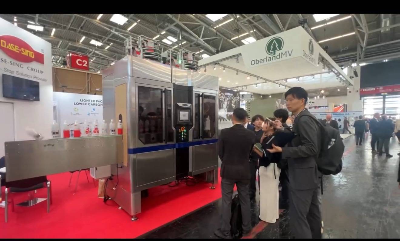 Dasrsing drinktec germany stand with sleeve applicator i-Sleeve ProII